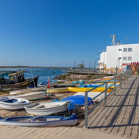Everlyn Apartment, De Tavira Conceição